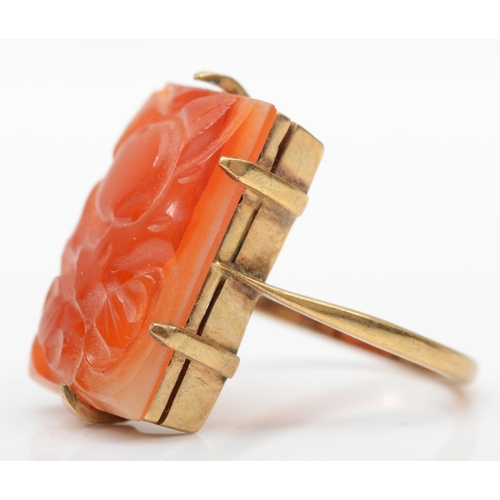 182 - A gold mounted carved jadeite panel ring , stamped 10, depicting fruit, 20 x 13mm, P, 4.8gm