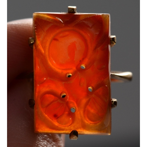 182 - A gold mounted carved jadeite panel ring , stamped 10, depicting fruit, 20 x 13mm, P, 4.8gm