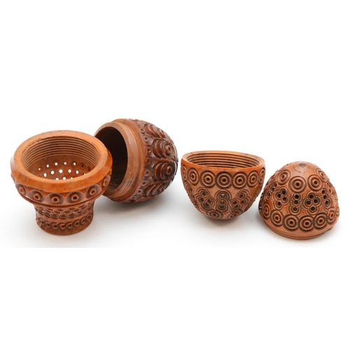 224 - Two 19th century carved wood eggs, thimble holders or pomanders, with screw oof covers, 6.5 and 5cm