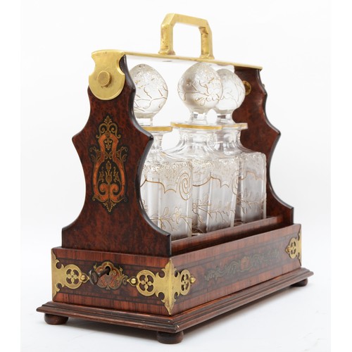 226 - A 19th century French burr walnut and rosewood three bottle tantalus, stamped D.P. DEPOSE, the frame... 