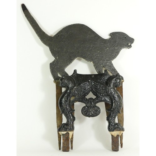 234 - A Victorian iron bird scarer in the form of a cat together with a Victorian cast iron boot scraper. ... 