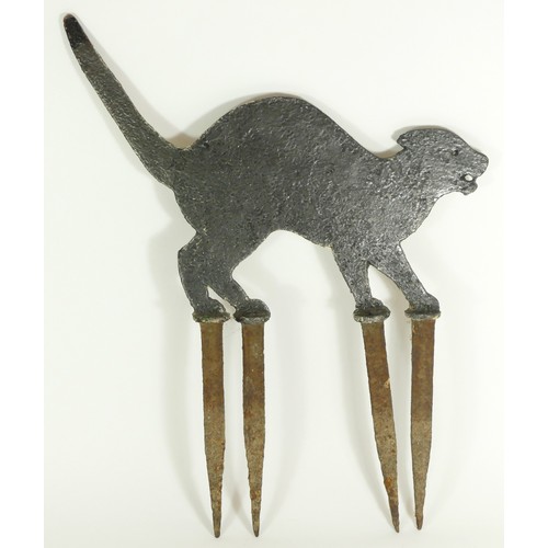 234 - A Victorian iron bird scarer in the form of a cat together with a Victorian cast iron boot scraper. ... 