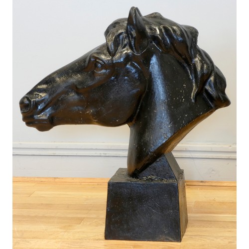 242 - A pair of metal horses heads, painted black, 62 x 58cm