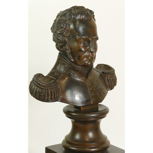 243 - A 19th century pair of bronze Germanic Generals busts, raised on plinths, 33cm