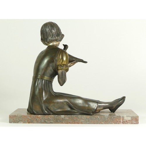 245 - An early 20th century spelter figure of a seated girl with a dove, raised on a marble base, 30 x 12 ... 