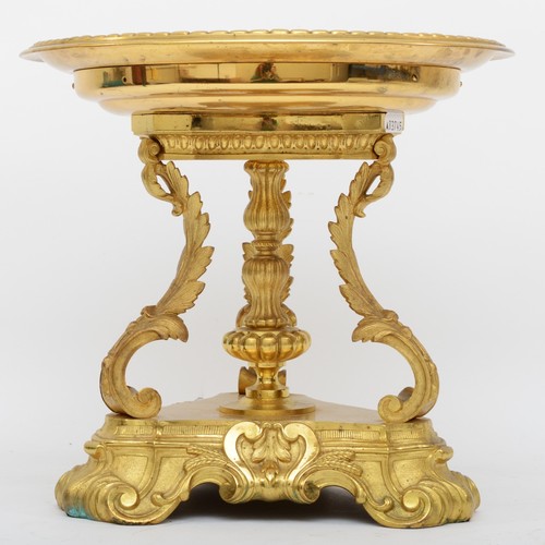 246 - A French late 19th century gilt bronze and marble table centrepiece, with central medallion, raised ... 