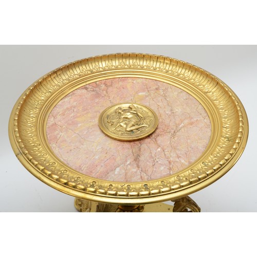 246 - A French late 19th century gilt bronze and marble table centrepiece, with central medallion, raised ... 