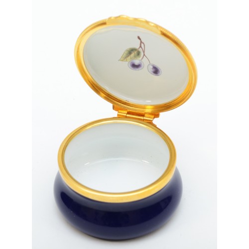 260 - A Royal Worcester pill box, Painted Fruits, signed by artist, S.Smith, 4.5cm diameter, together with... 