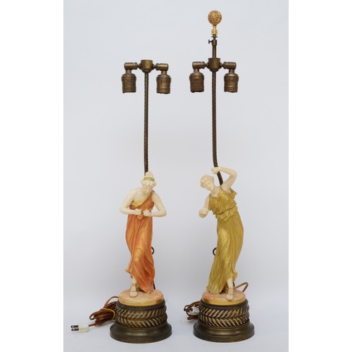 265 - A pair of Royal Worcester gilt and blush ivory figures of Classical Maidens table lamps,  modelled b... 