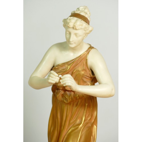 266 - A pair of Royal Worcester gilt and blush ivory figures of Classical Maidens, modelled by James Hadle... 