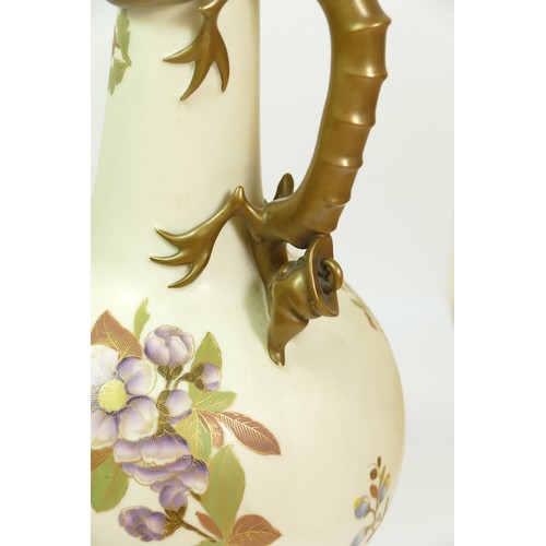 267 - A Royal Worcester blush ivory jug, pattern 1015, of globular form with dragon handle, the body paint... 