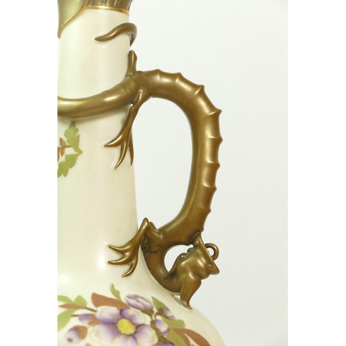 267 - A Royal Worcester blush ivory jug, pattern 1015, of globular form with dragon handle, the body paint... 