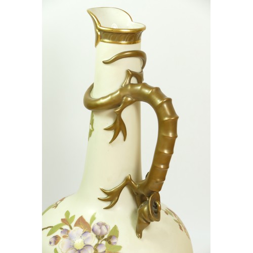 267 - A Royal Worcester blush ivory jug, pattern 1015, of globular form with dragon handle, the body paint... 