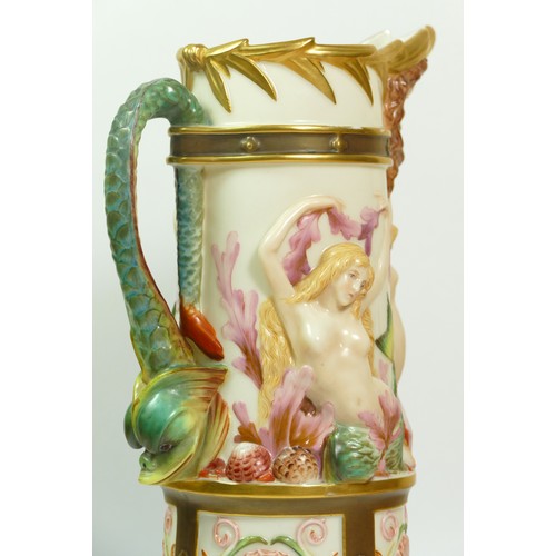 268 - A Royal Worcester blush ivory pitcher with Bacchus mask spout the body with Venus and mermaids, sea ... 