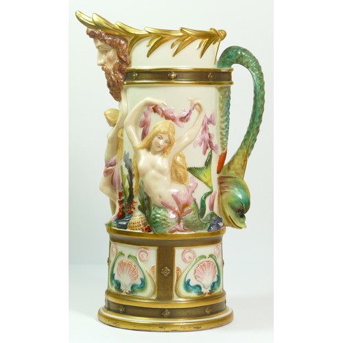 268 - A Royal Worcester blush ivory pitcher with Bacchus mask spout the body with Venus and mermaids, sea ... 