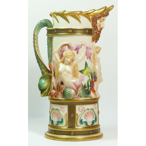 268 - A Royal Worcester blush ivory pitcher with Bacchus mask spout the body with Venus and mermaids, sea ... 