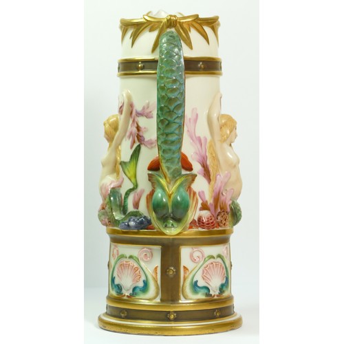 268 - A Royal Worcester blush ivory pitcher with Bacchus mask spout the body with Venus and mermaids, sea ... 