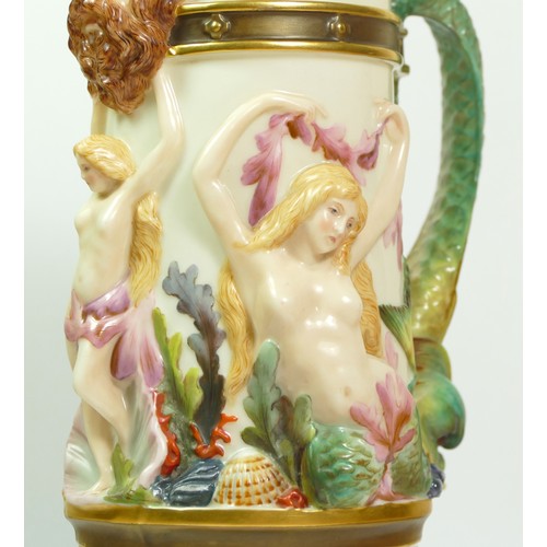 268 - A Royal Worcester blush ivory pitcher with Bacchus mask spout the body with Venus and mermaids, sea ... 