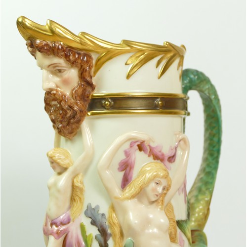 268 - A Royal Worcester blush ivory pitcher with Bacchus mask spout the body with Venus and mermaids, sea ... 