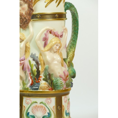 268 - A Royal Worcester blush ivory pitcher with Bacchus mask spout the body with Venus and mermaids, sea ... 