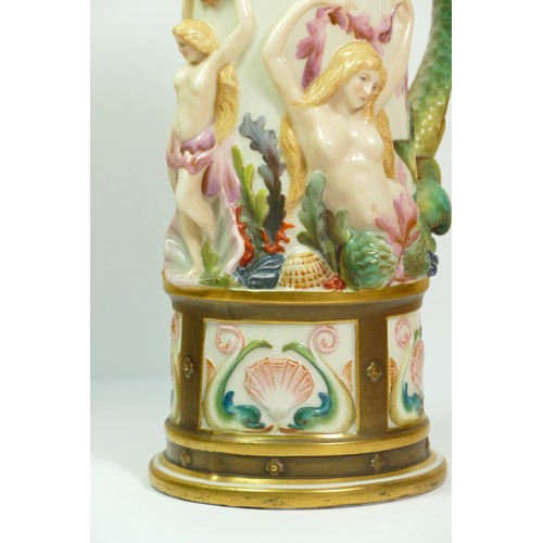 268 - A Royal Worcester blush ivory pitcher with Bacchus mask spout the body with Venus and mermaids, sea ... 