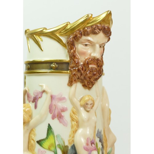 268 - A Royal Worcester blush ivory pitcher with Bacchus mask spout the body with Venus and mermaids, sea ... 