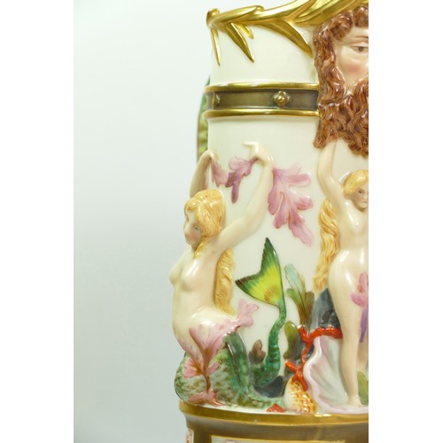 268 - A Royal Worcester blush ivory pitcher with Bacchus mask spout the body with Venus and mermaids, sea ... 