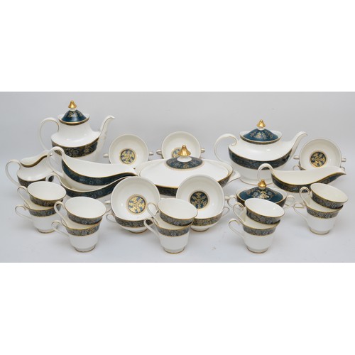 299 - A Royal Doulton Carlyle pattern No 5018 dinner/tea service, comprising; ten cups & saucers, ten side... 