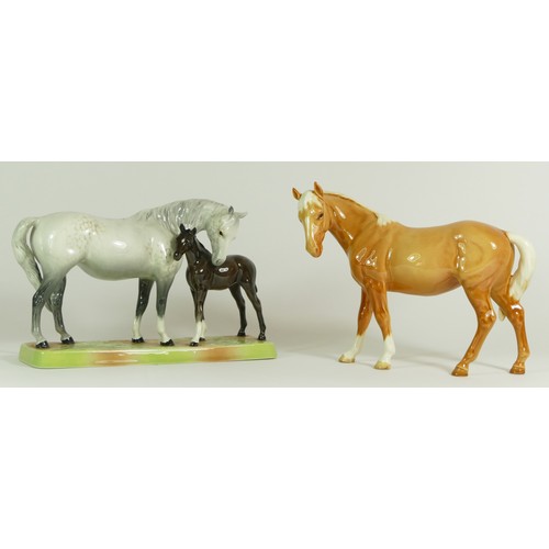 311 - A group of Beswick mare models, comprising of a Palomino, a brown bay, two shire horses and a grey I... 