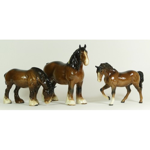 311 - A group of Beswick mare models, comprising of a Palomino, a brown bay, two shire horses and a grey I... 