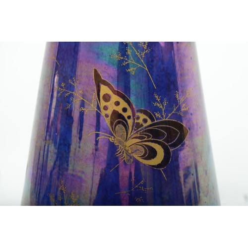 291 - A Crown Devon Fielding lustre vase, of cylindrical form with butterfly decoration, 31cm tall.