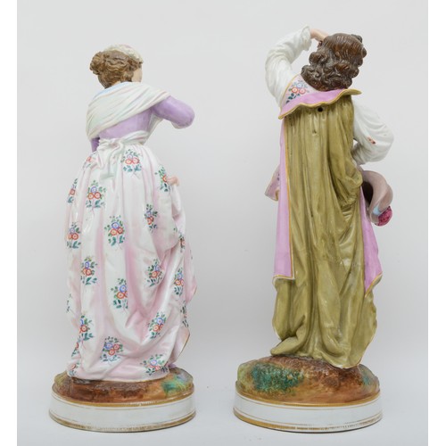 282 - A large pair of early 20th century continental figures, probably Sitzendorf, depicting a man and wom... 