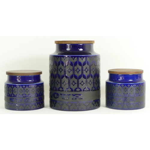 297 - A collection of Hornsea Heirloom blue storage jars, salt and pepper pots, spice rack with jars and a... 