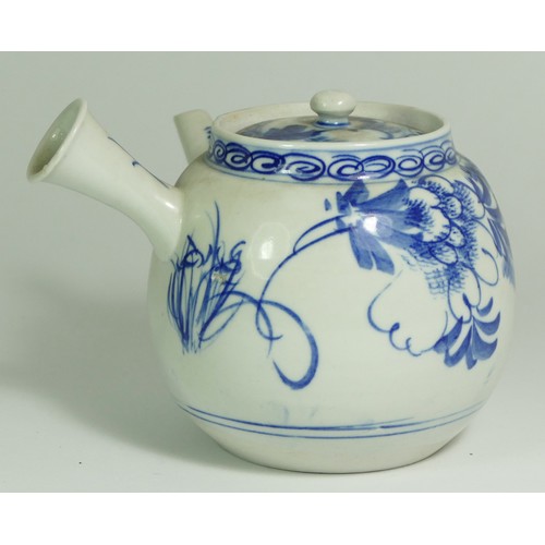 322 - A Japanese Meiji period porcelain teapot, early 20th century, decorated with foliage, 12cm tall.