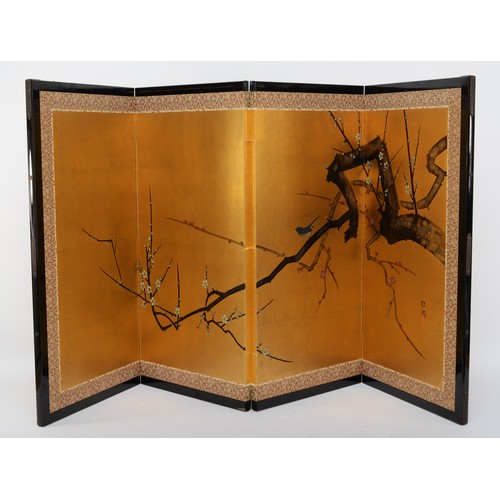 323 - A Japanese byobu gold paper folding screen divider, four panels with ebonised frame depicting birds ... 