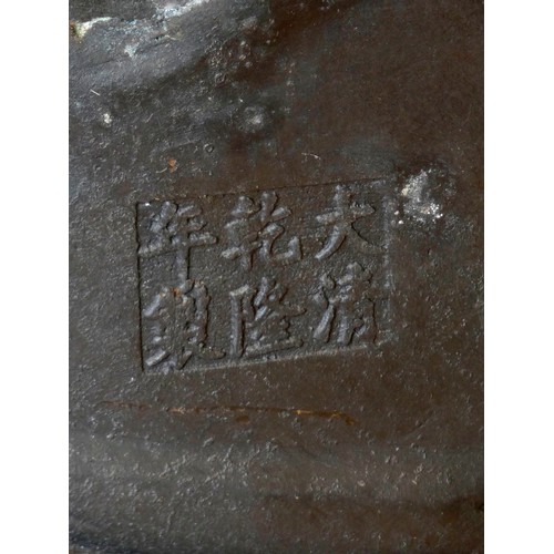 327 - A Chinese large bronze of Guanyin or Kuan Yin, seated on waves, six character mark to the back, 75cm