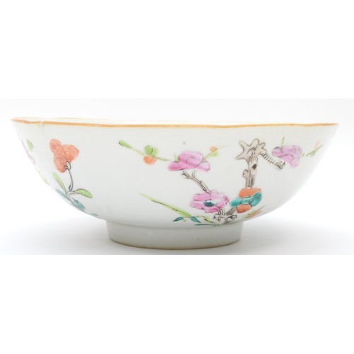 332 - A Chinese porcelain famille rose bowl, painted in overglaze enamels to show garland and flowers, 18.... 