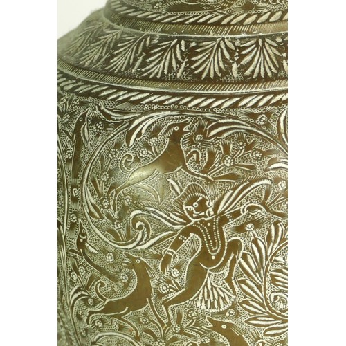 341 - An Indian pair of brass two handled vases, with all over animal and hunter decoration, 32.5cm