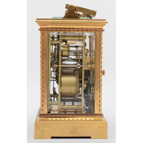 351 - A 20th century polished gilt brass striking and repeating carriage clock, having push button repeat ... 