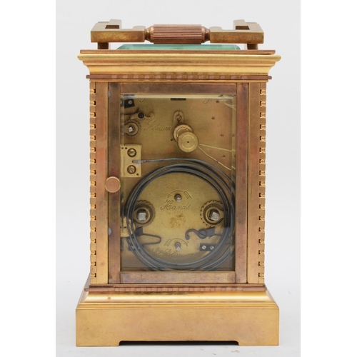 351 - A 20th century polished gilt brass striking and repeating carriage clock, having push button repeat ... 