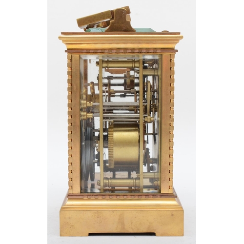 351 - A 20th century polished gilt brass striking and repeating carriage clock, having push button repeat ... 