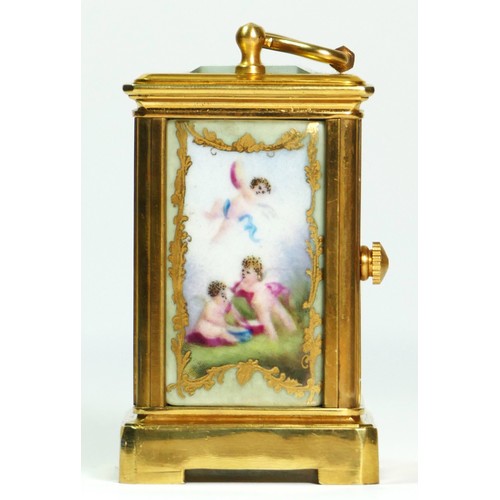 354 - A brass and porcelain panel small carriage timepiece, decorated with cherubs, 6.5cm