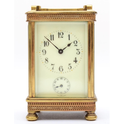 356 - An early 20th century brass alarm carriage clock, with 8 day movement striking on bell. 13cm tall, w... 