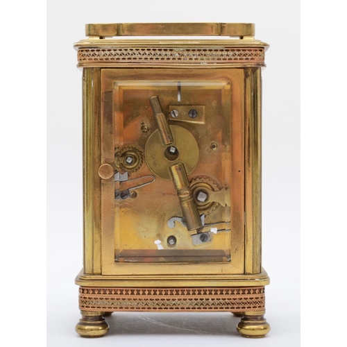 356 - An early 20th century brass alarm carriage clock, with 8 day movement striking on bell. 13cm tall, w... 