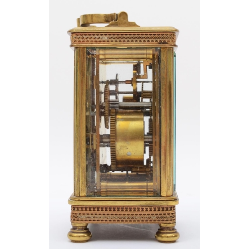 356 - An early 20th century brass alarm carriage clock, with 8 day movement striking on bell. 13cm tall, w... 