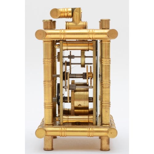 357 - A brass carriage clock, retailed by Elliott & Son London, with stylised bamboo gilt frame, housing a... 