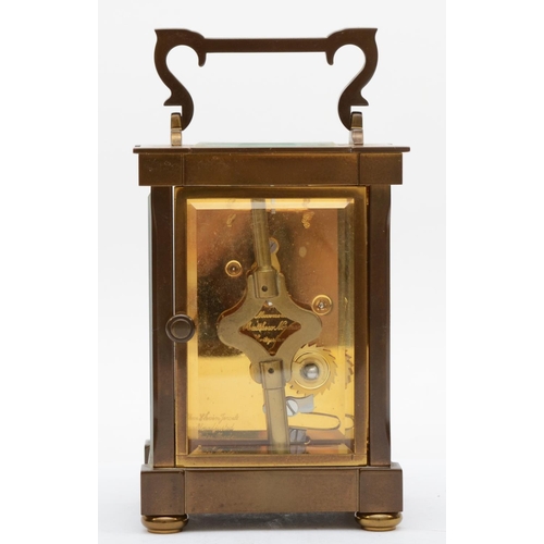 358 - A Matthew Norman of London brass carriage clock, having Swiss eight day movement, boxed with key and... 