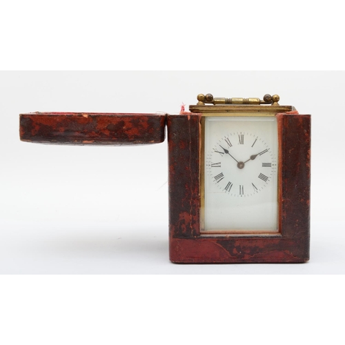 361 - A brass eight day carriage clock, enamelled dial with Roman numerals, complete with travel case. 12c... 