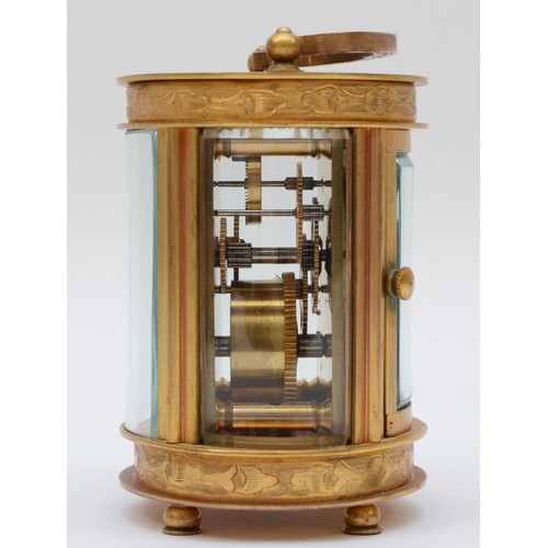 362 - An Elliott & Son eight day carriage clock, chased gilt case of oval form. 9cm tall.