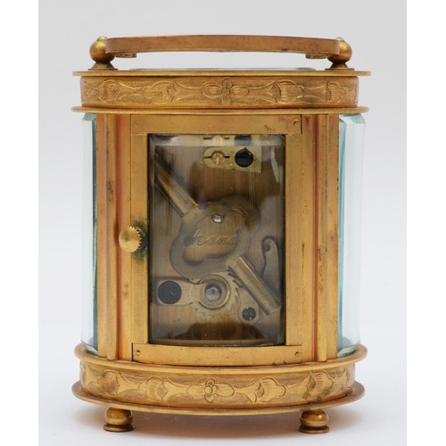 362 - An Elliott & Son eight day carriage clock, chased gilt case of oval form. 9cm tall.